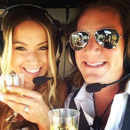 Hayley Stommel showing her engagement ring.